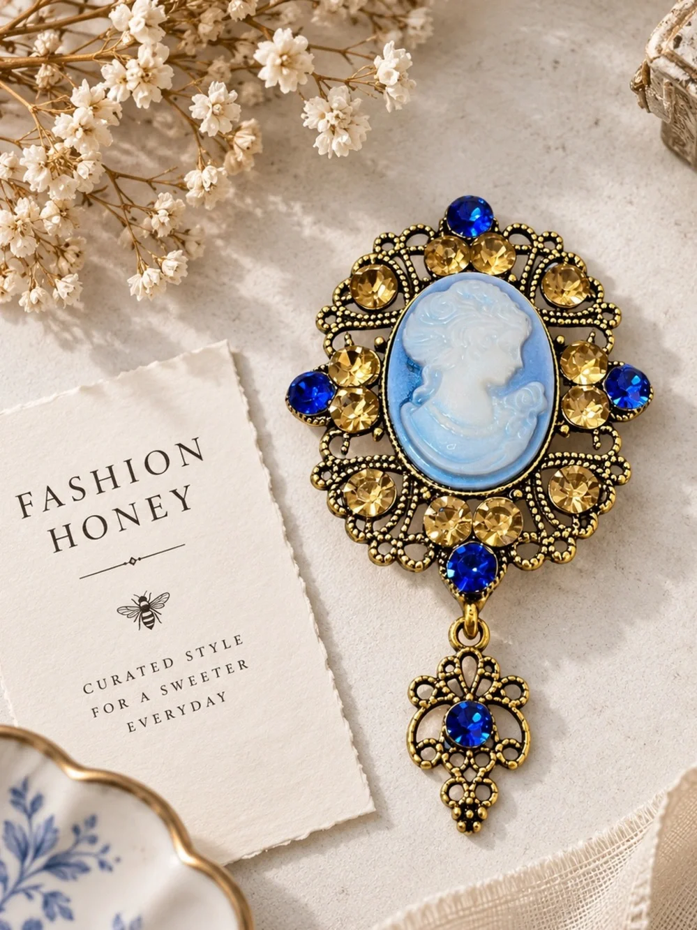 Vintage-Inspired Blue Cameo Brooch with Gold-Tone Filigree and Blue Crystals